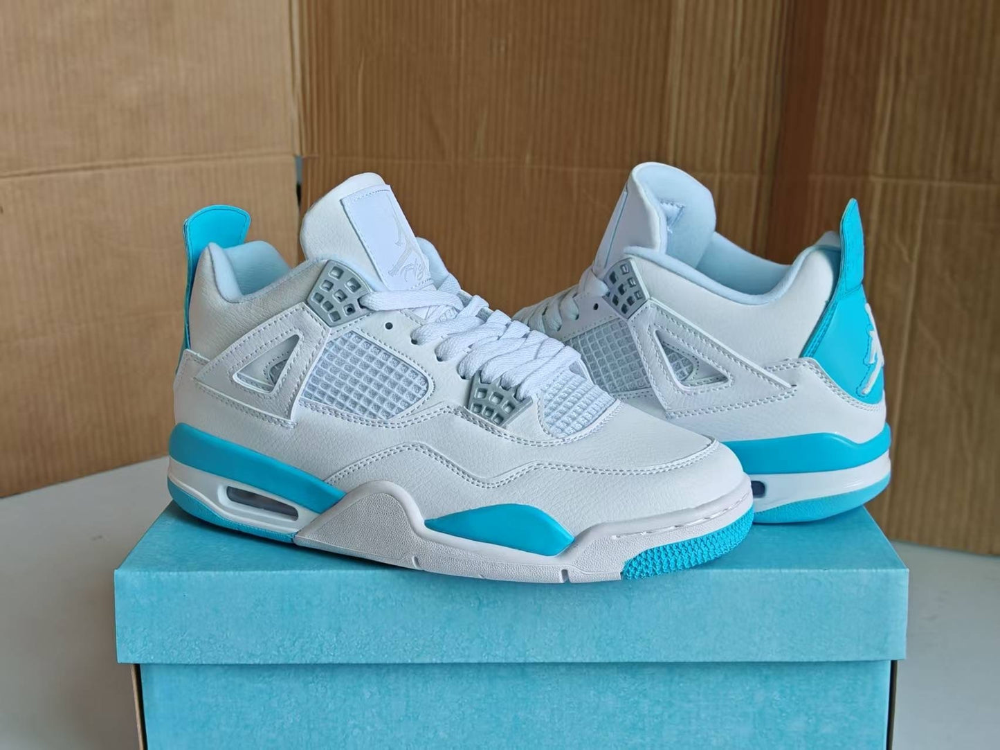 Air Jordan 4 Retro 'Ice Blue'