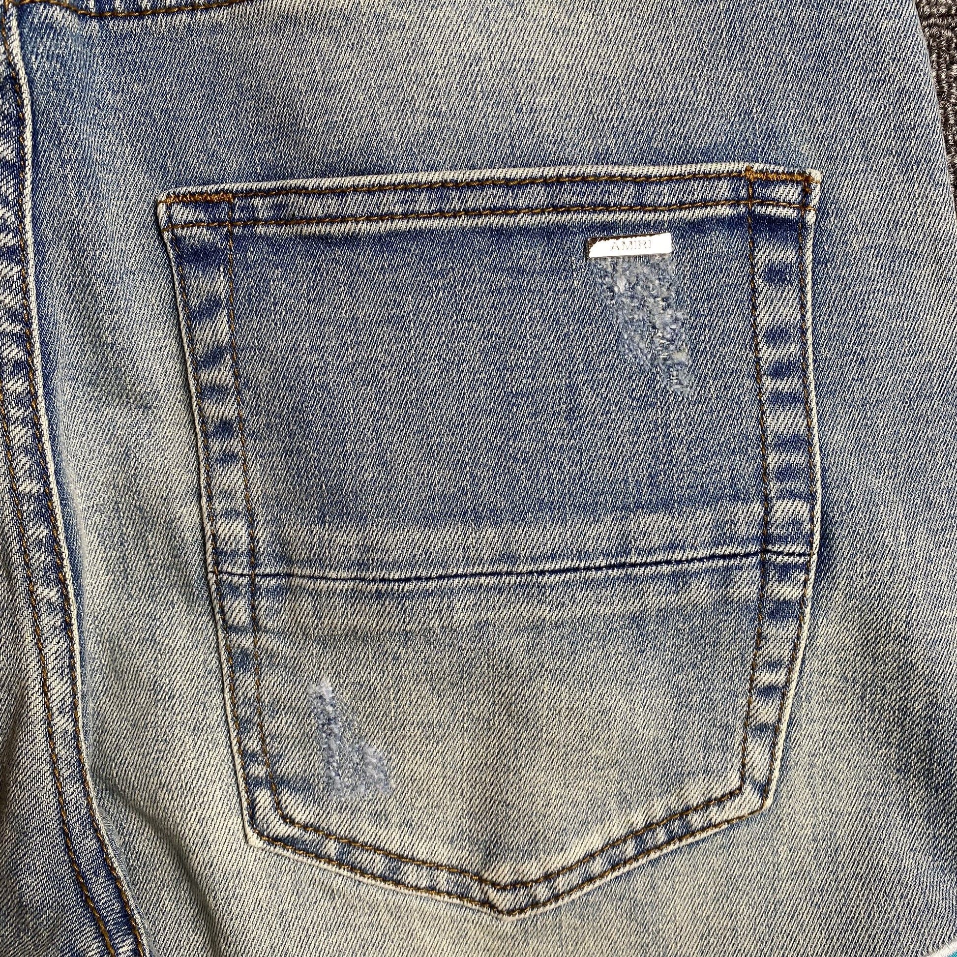 AMIRI VARSITY LOGO JEANS - Prime Reps