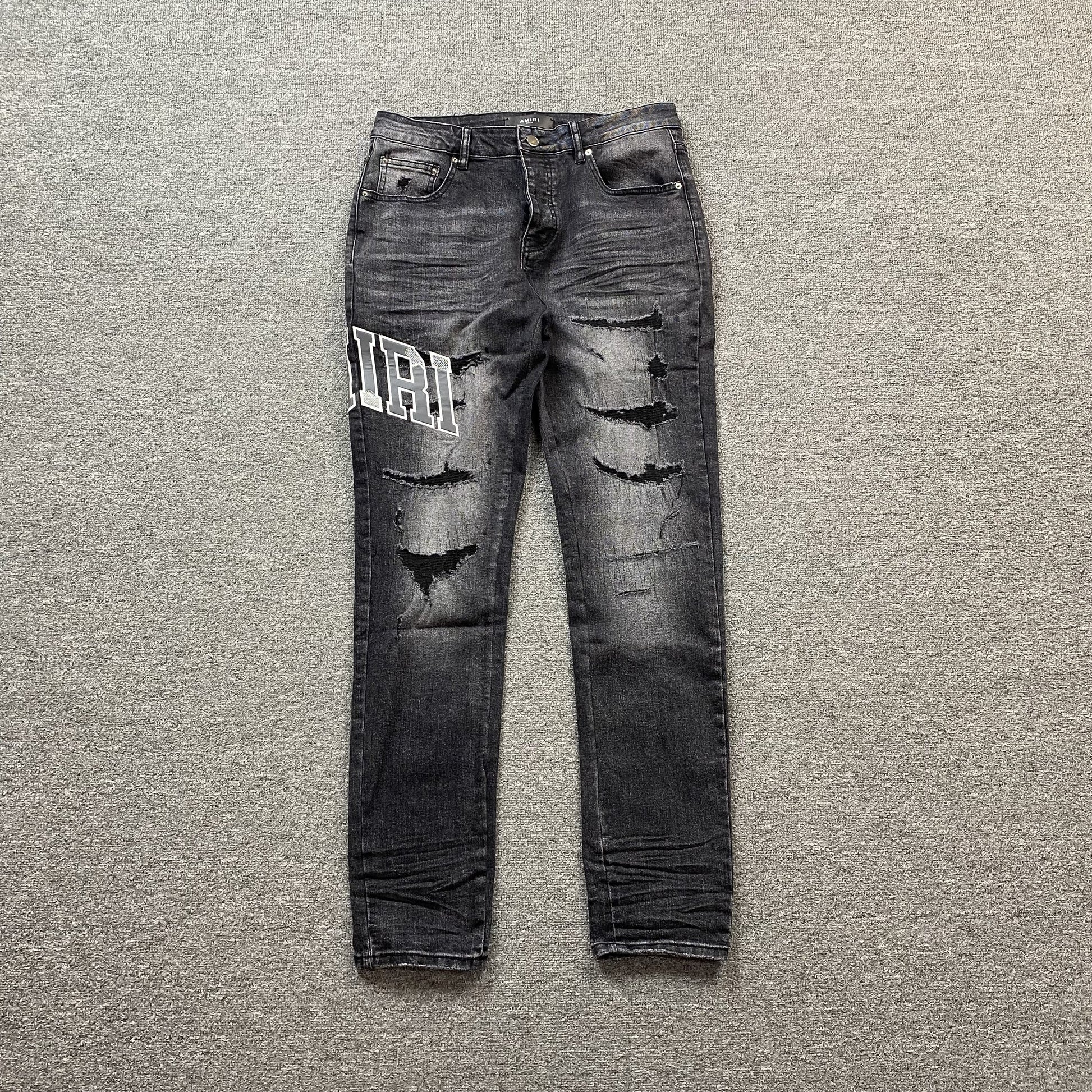 AMIRI VARSITY LOGO REPAIR JEANS - Prime Reps
