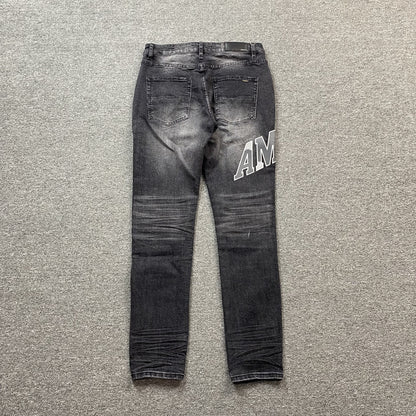 AMIRI VARSITY LOGO REPAIR JEANS - Prime Reps