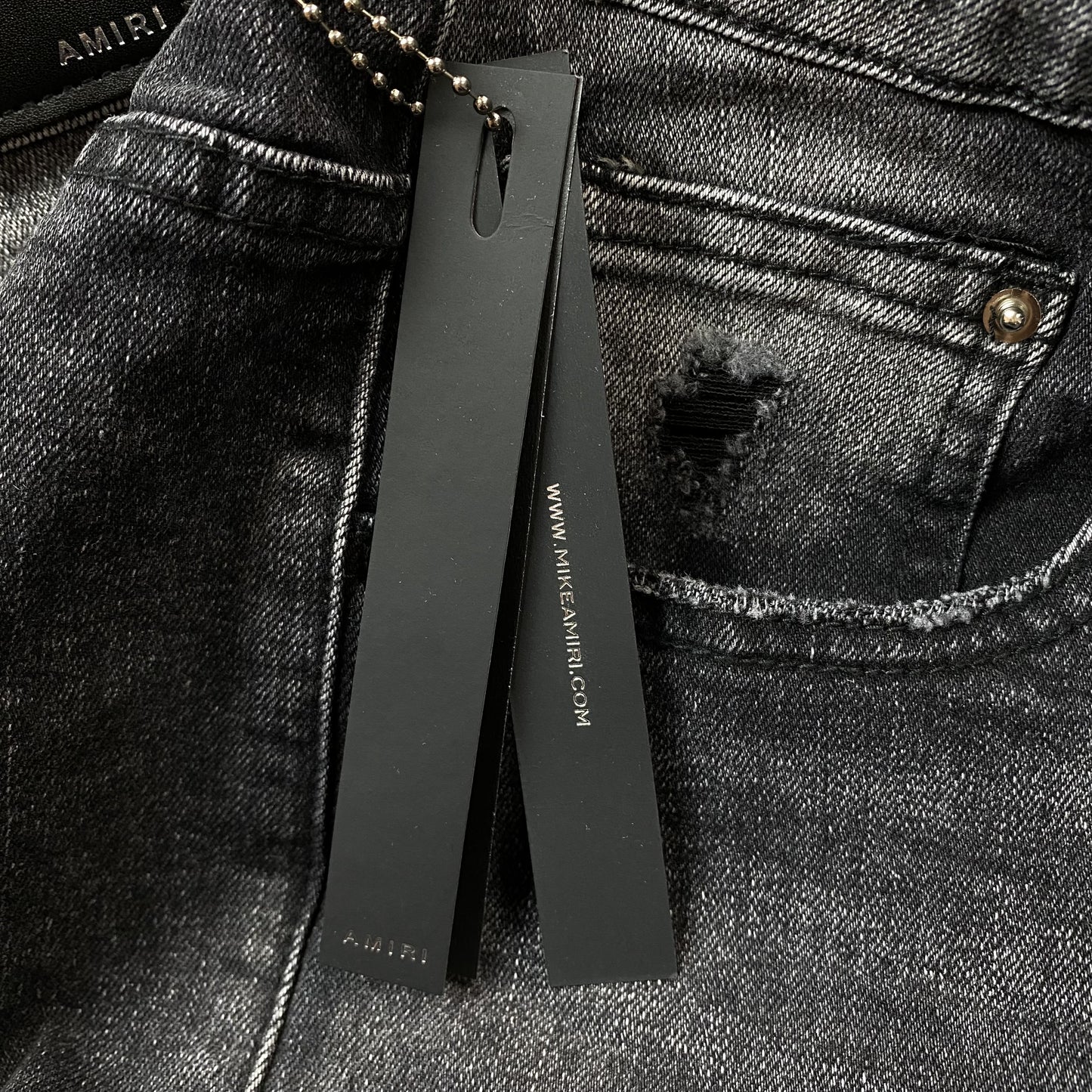 AMIRI VARSITY LOGO REPAIR JEANS - Prime Reps