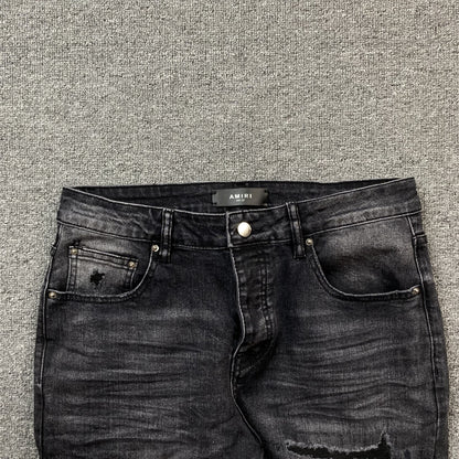 AMIRI VARSITY LOGO REPAIR JEANS - Prime Reps