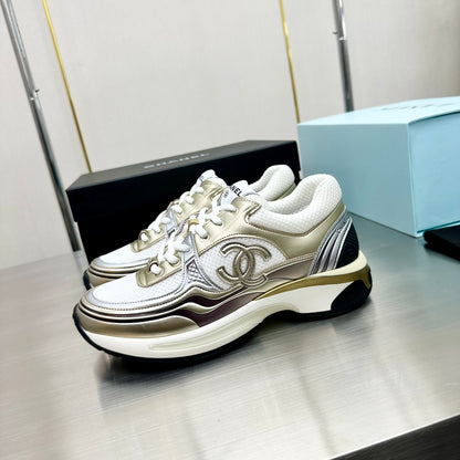 CHANEL CC RUNNERS SNEAKERS WHITE AND GOLD - Prime Reps