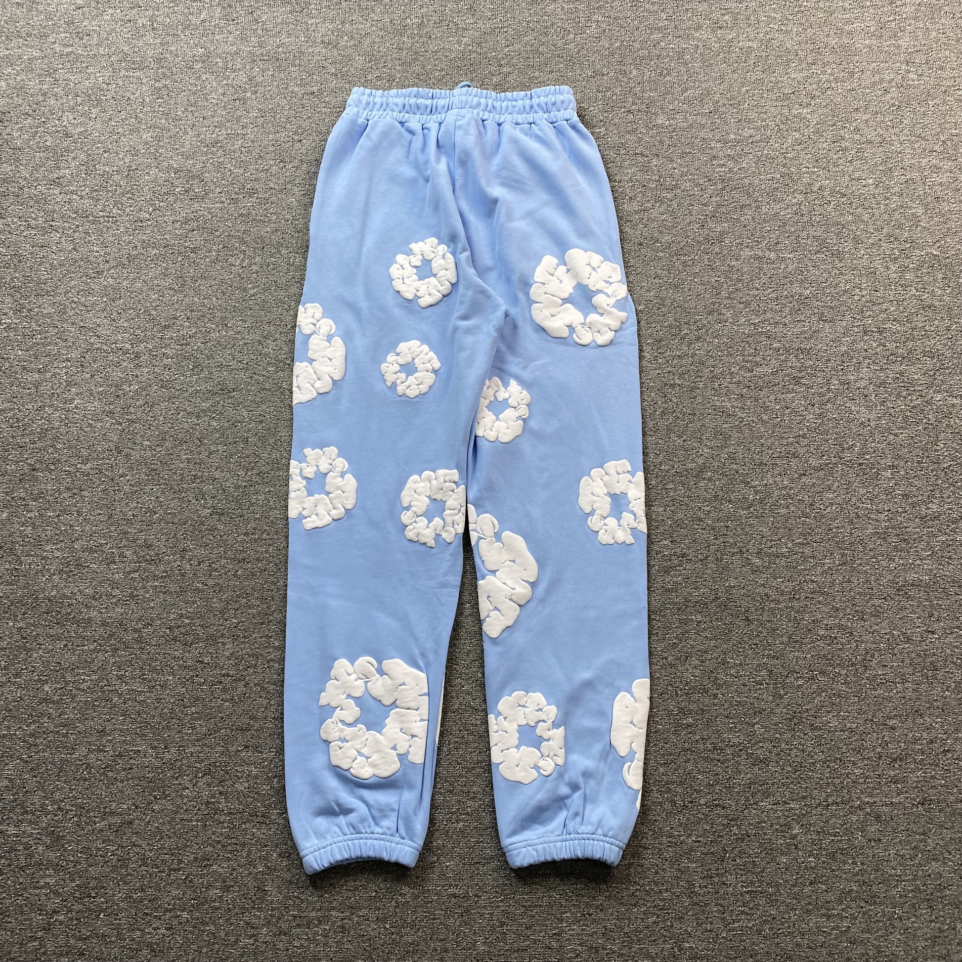 DENIM TEARS COTTON WREATH SWEATPANTS BABY BLUE - Prime Reps
