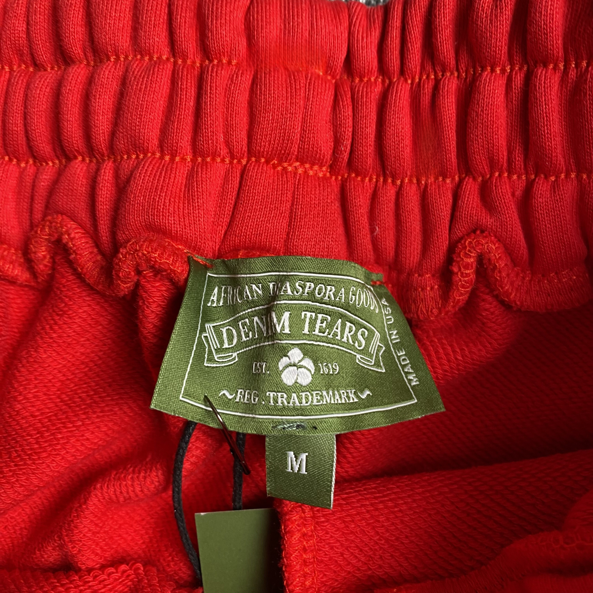 DENIM TEARS COTTON WREATH SWEATPANTS RED - Prime Reps