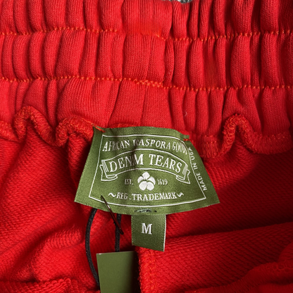 DENIM TEARS COTTON WREATH SWEATPANTS RED - Prime Reps