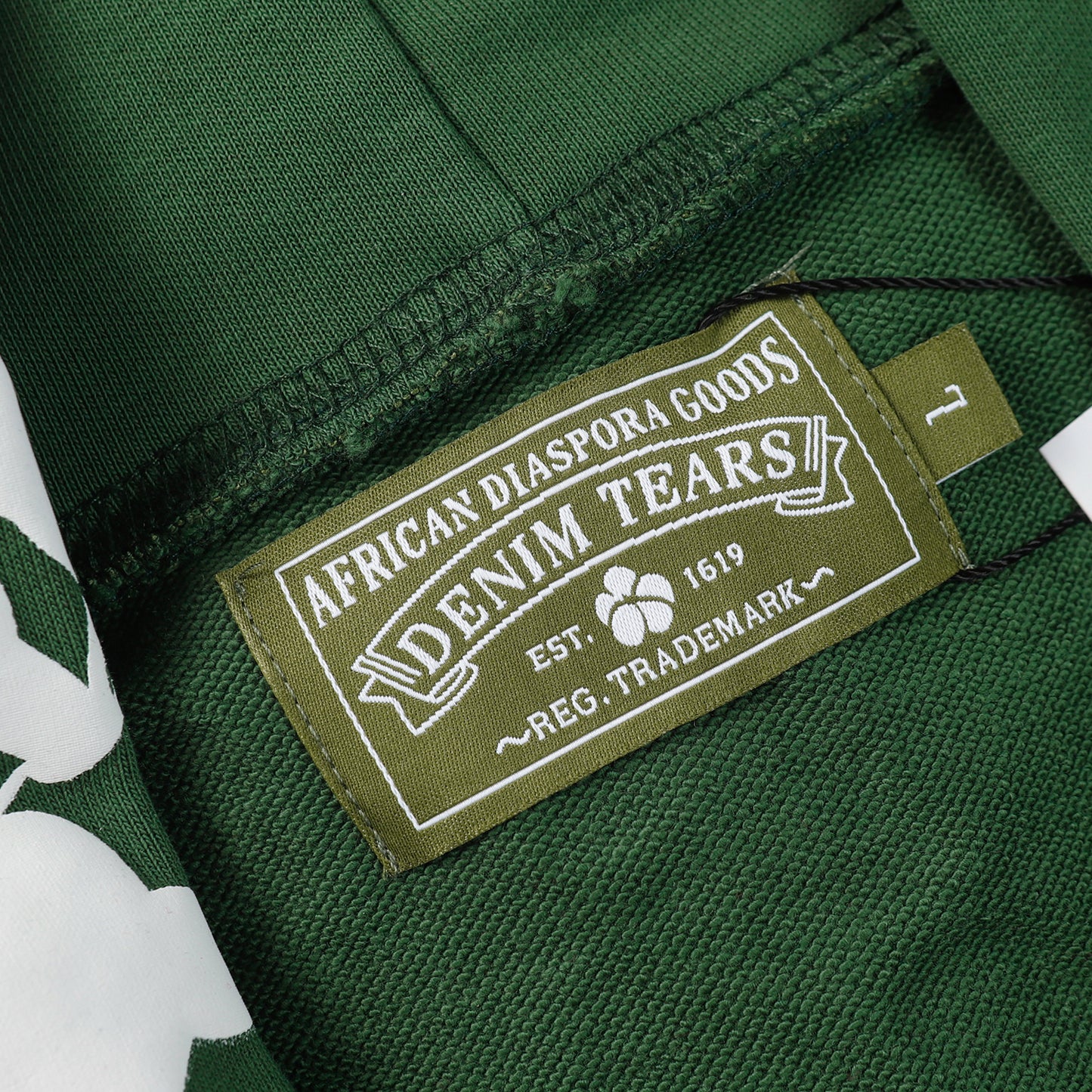 DENIM TEARS HOODIE GREEN - Prime Reps