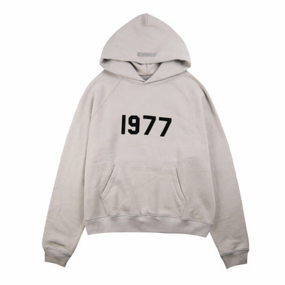 FEAR OF GOD ESSENTIALS "1977" HOODIE STONE GREY - Prime Reps