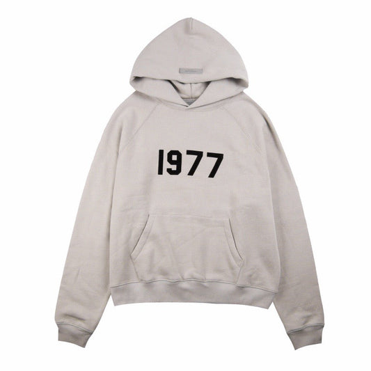 FEAR OF GOD ESSENTIALS "1977" HOODIE STONE GREY - Prime Reps