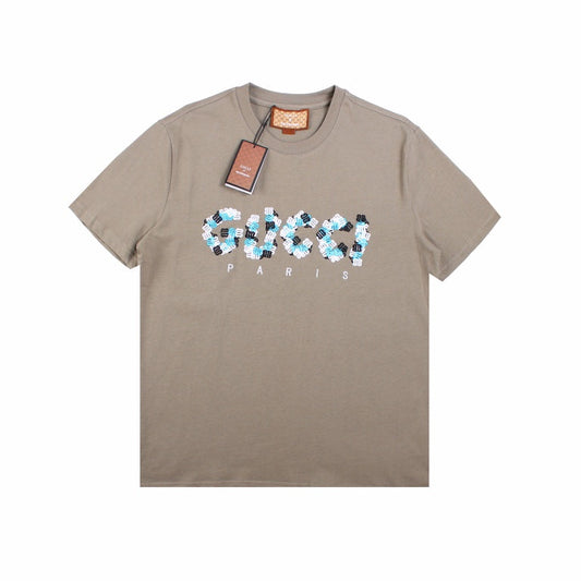 GUCCI x BALENCIAGA FLOWER LOGO T-SHIRT KHAKI - Prime Reps